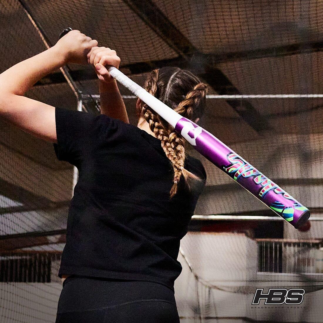 A Softball Player Swinging The new 2025 DeMarini SPRYTE (-12) Fastpitch Softball Bat from Headbanger Sports