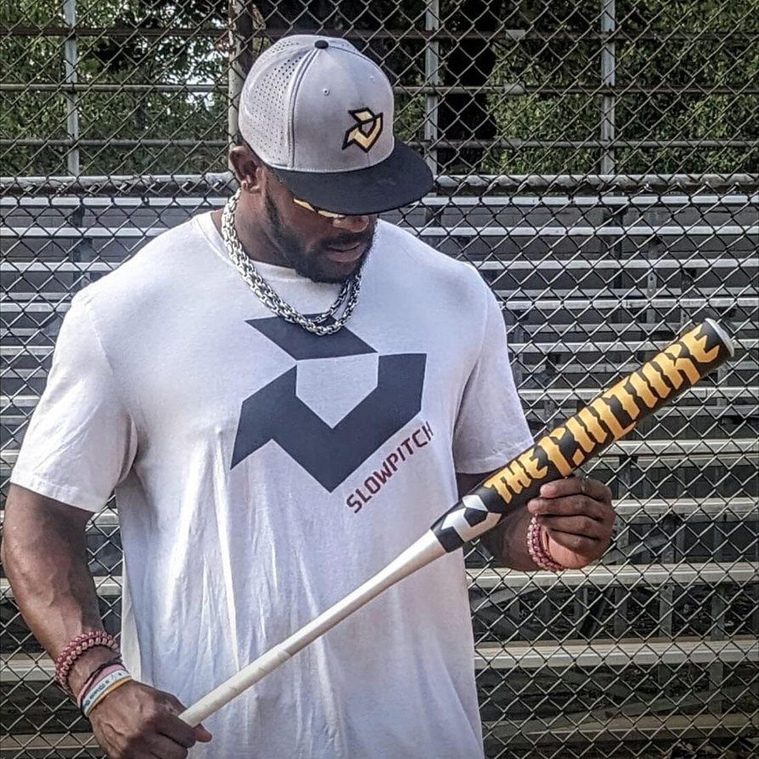 A Slowpitch Softball Player holding the new DeMarini The Culture BSC Limited Edition Slowpitch Bat from Headbanger Sports