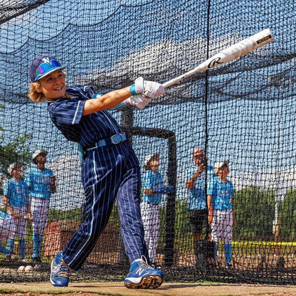 A youth baseball player holding the new Rawlings 2025 Icon from Headbanger Sports while swinging in the batting cage